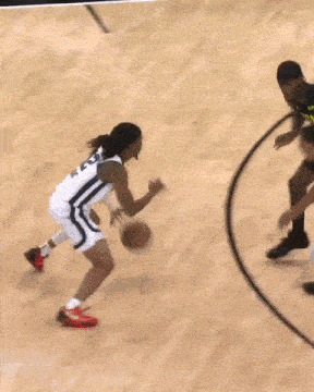 a basketball player with the number 12 on their jersey