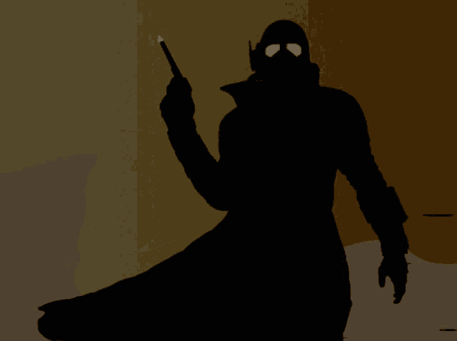 a silhouette of a person holding a wand with the letter s visible on it