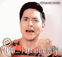 a man with his fist in the air says wow fantastic baby !
