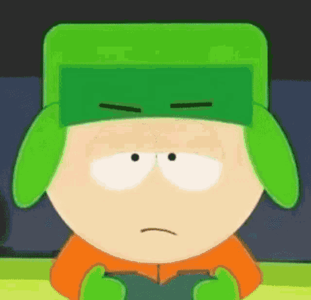 a close up of a cartoon character wearing a green hat with a sad look on his face .