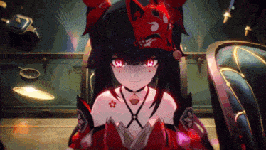 a girl in a red and black costume with a red flame on her head