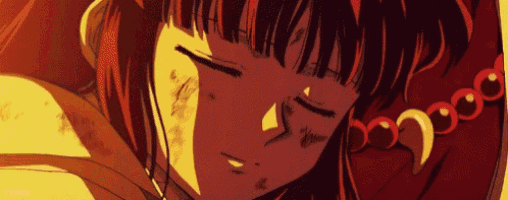 a close up of a person 's face with their eyes closed and a necklace around their neck .