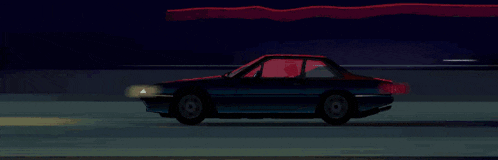 a car is driving down a road at night with a red tail light