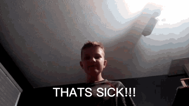 a young boy says that 's sick in front of a light
