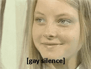a close up of a woman 's face with the words " gay silence " written on it