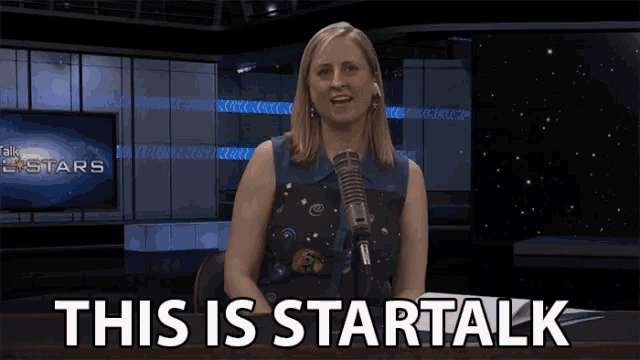 a woman sitting in front of a microphone with the words this is startalk above her