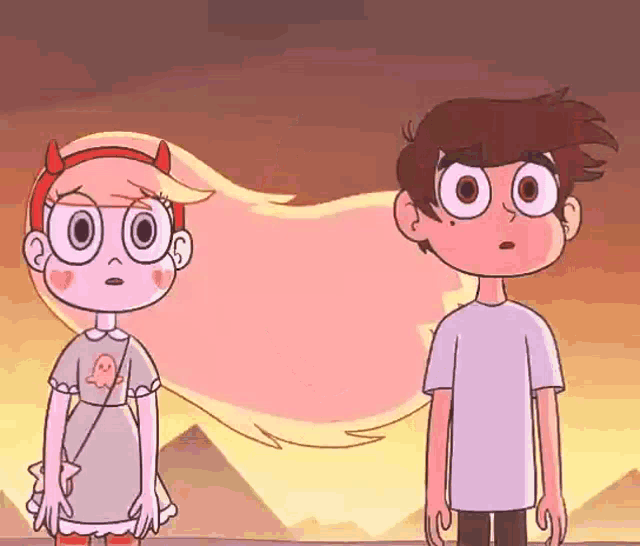a boy and a girl from star vs the forces of evil standing next to each other .