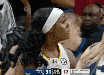 a basketball game between uconn and south carolina is being played