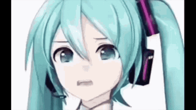 a close up of hatsune miku wearing headphones and making a surprised face .