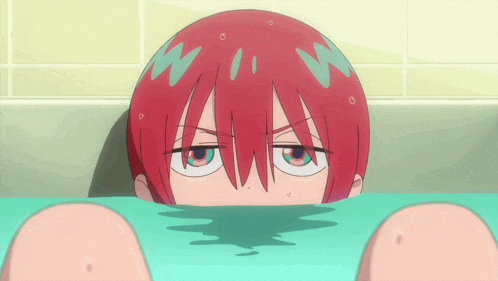 a cartoon character with red hair and blue eyes is laying in a bathtub