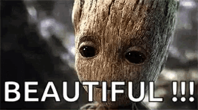 a baby groot from guardians of the galaxy is looking at the camera with the words `` beautiful !!! '' written above him .