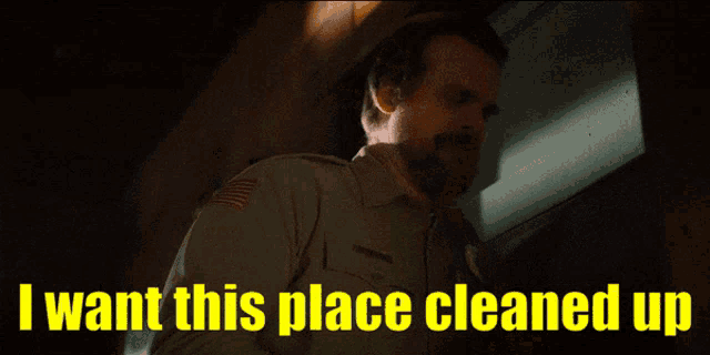 a man says " i want this place cleaned up " in yellow letters