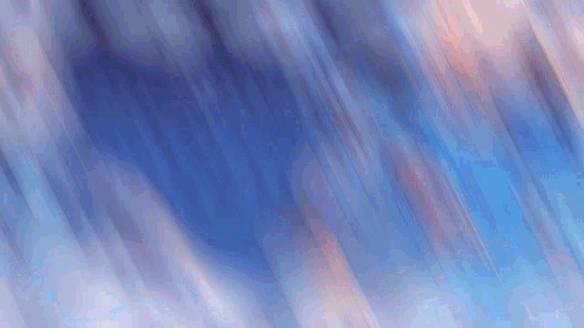 a blurry image of a blue and white background