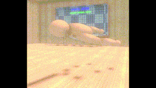 a blurred image of a person laying on a bed in front of a tetris screen