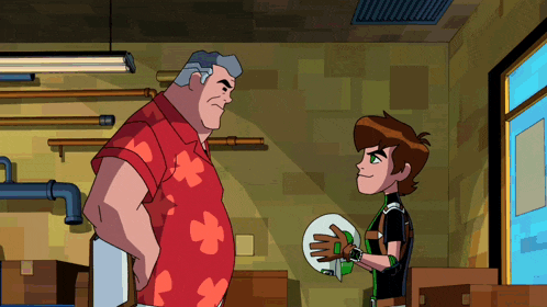 a man in a red shirt is standing next to a boy