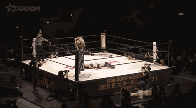 a wrestling ring with a sign that says stardom