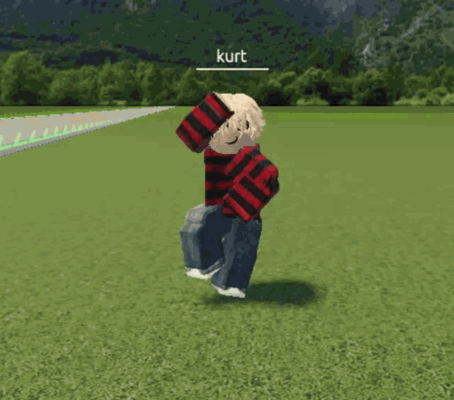 a person in a red and black striped shirt is walking in a field with kurt written on the bottom right