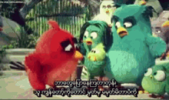 a group of angry birds standing next to each other with a foreign language caption