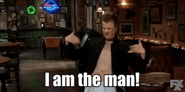 a man without a shirt is in a bar and says i am the man