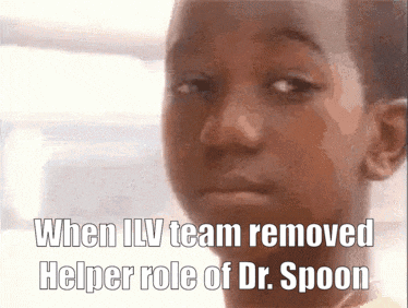 a young boy is looking at the camera with a caption that says when ilv team removed helper role of dr. spoon