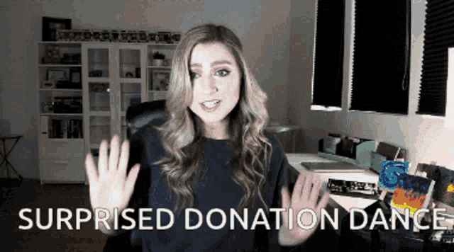 a woman sitting in front of a desk with surprised donation dance written on the bottom
