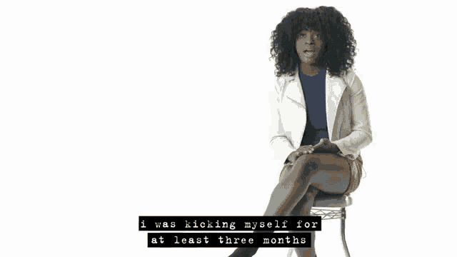a woman is sitting on a stool with the words " not knowing why i didn 't listen to the album sooner "
