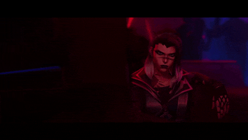 a man with a beard is standing in the dark with a red light coming out of his face