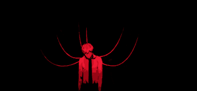 a close up of a person 's face with a red background