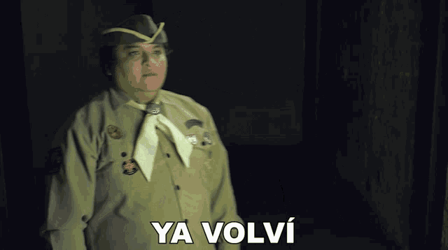 a woman in a boy scout uniform says ya volvi
