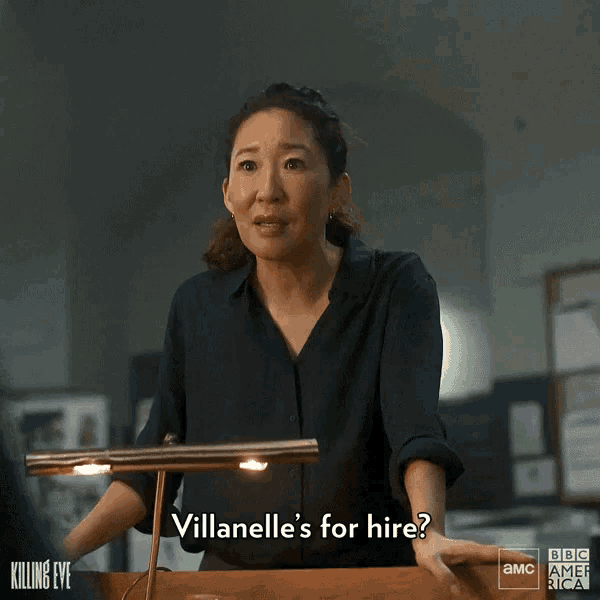 a woman stands in front of a lamp with the words let 's hire her on the bottom