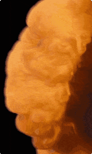 a close up of a smoke coming out of a fire