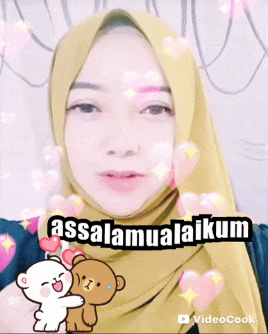 a woman wearing a hijab says assalamualaikum with a teddy bear hugging her