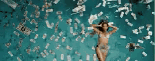 a woman in a bikini is floating in a pool of money .