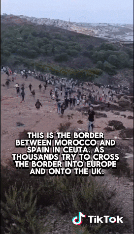 a tiktok video shows a crowd of people crossing the border into europe