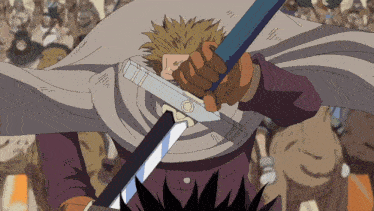 a man is holding a sword in front of a crowd of people
