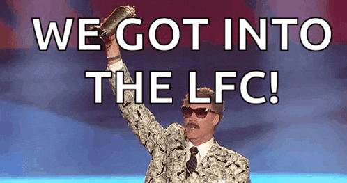 a man in a suit and tie is holding a trophy and says we got into the lfc !