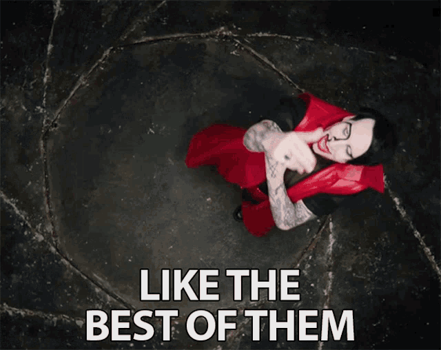 a man in a red cape with the words like the best of them behind him