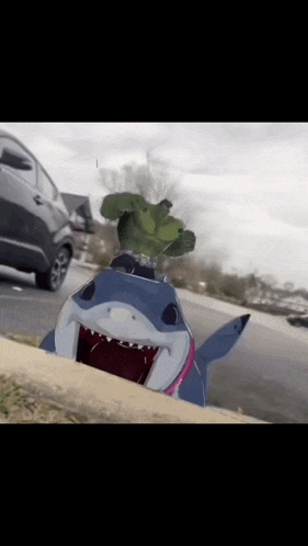 a picture of a shark with a hulk on it 's head