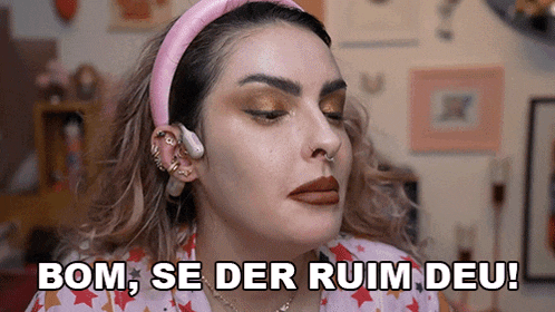 a woman wearing a pink headband says bom se der ruim deu !