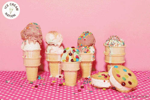 ice cream cones are lined up on a pink polka dot table cloth with a yahoo food logo in the background
