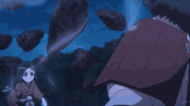 a person is holding a sword in their hand and a blue light is coming from it .