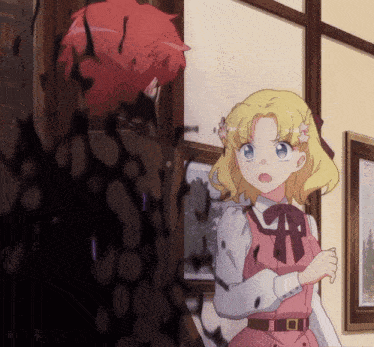 a girl in a pink dress stands next to a man in a red shirt