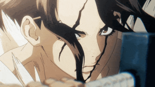 a close up of a person 's face with tears coming out of their eyes