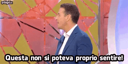 a man in a suit says questa non si poteva proprio sentire !