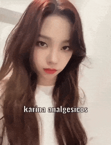 a close up of a woman 's face with the words `` karina analgesicos '' written on the bottom .