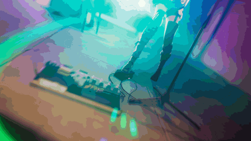 a blurry picture of a person playing a guitar
