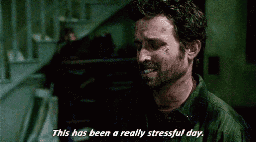 a man in a green shirt is talking about a really stressful day