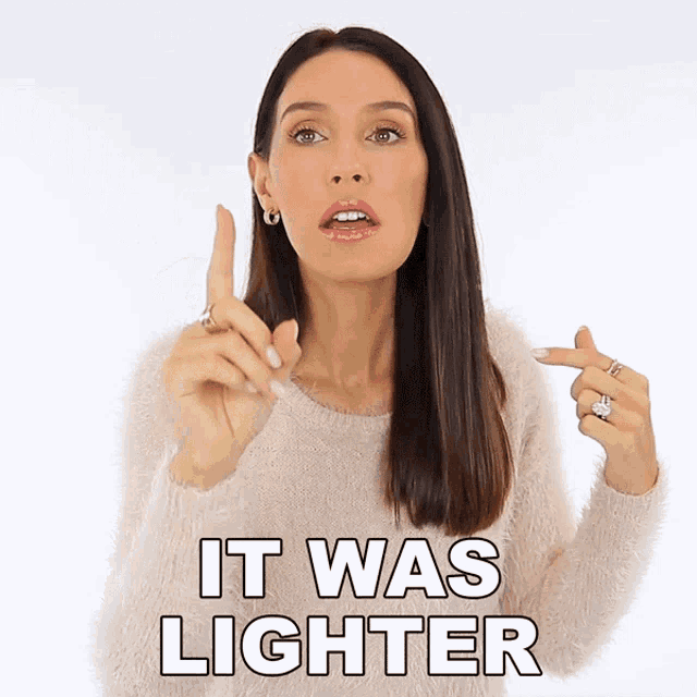 a woman says it was lighter while pointing at something