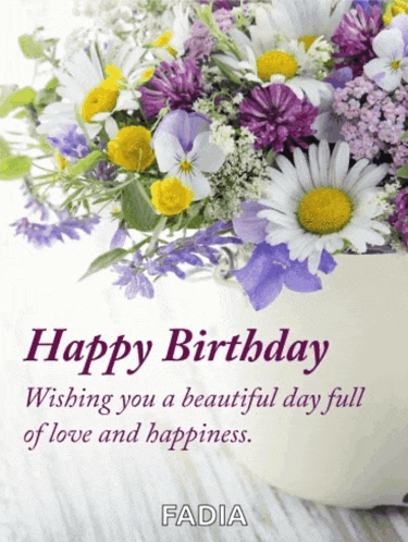 a birthday card with flowers and the name fadia at the bottom