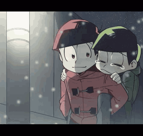 a couple of cartoon characters are standing next to each other and one of them is crying .